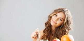 Making ‘Quarantine Care’ A Priority Girl eating healthy food in quarantine.