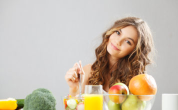 Making ‘Quarantine Care’ A Priority Girl eating healthy food in quarantine.