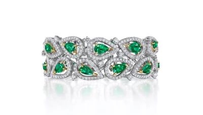 Emeralds Circumferenced By Diamonds In A Bracelet, Oscar Heyman