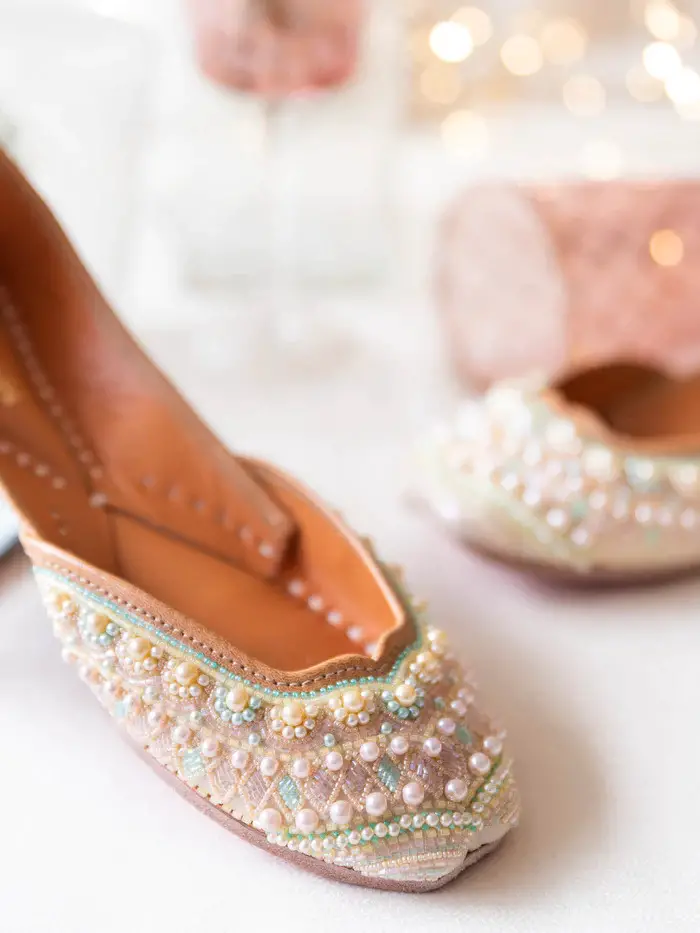 Groom juttis, also known as mojaris, are a traditional Indian footwear choice for grooms on their wedding day.