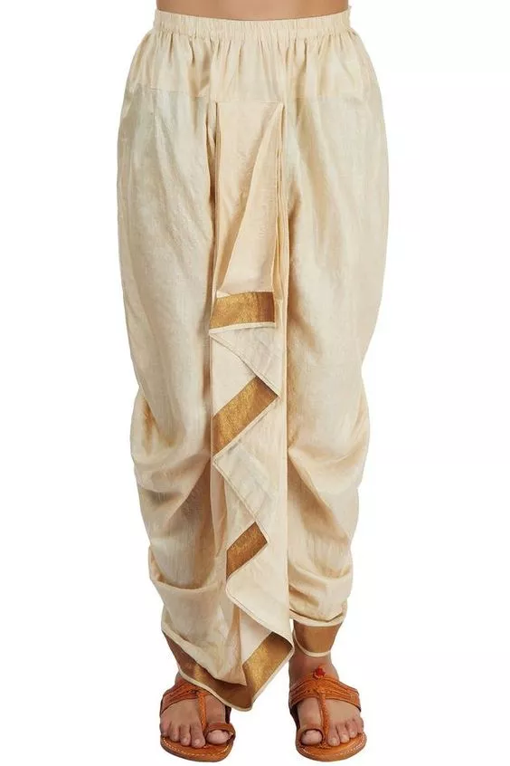 This style of dhoti is worn with a tucked-in scarf 
