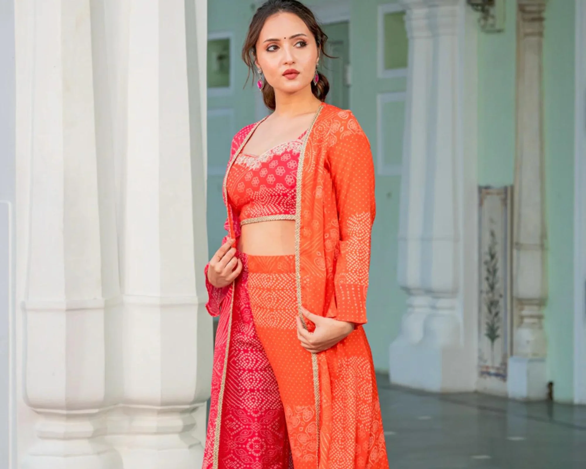Organza saree with a golden border and pair it with chunky silver jewellery to shine like a diva in your Navratri celebrations.